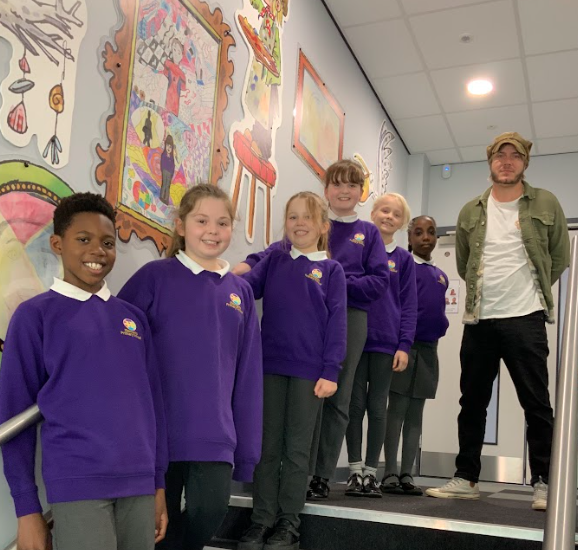 ElementsSchool's tweet photo. What a pleasure to have @dannydeeptown  in school this morning to meet the children who have produced art for our stairwell. He was blown away with their pieces and very happy with how the stairwell looks. Another first for Elements...Our own art gallery. https://t.co/H5kJR1l8Bf