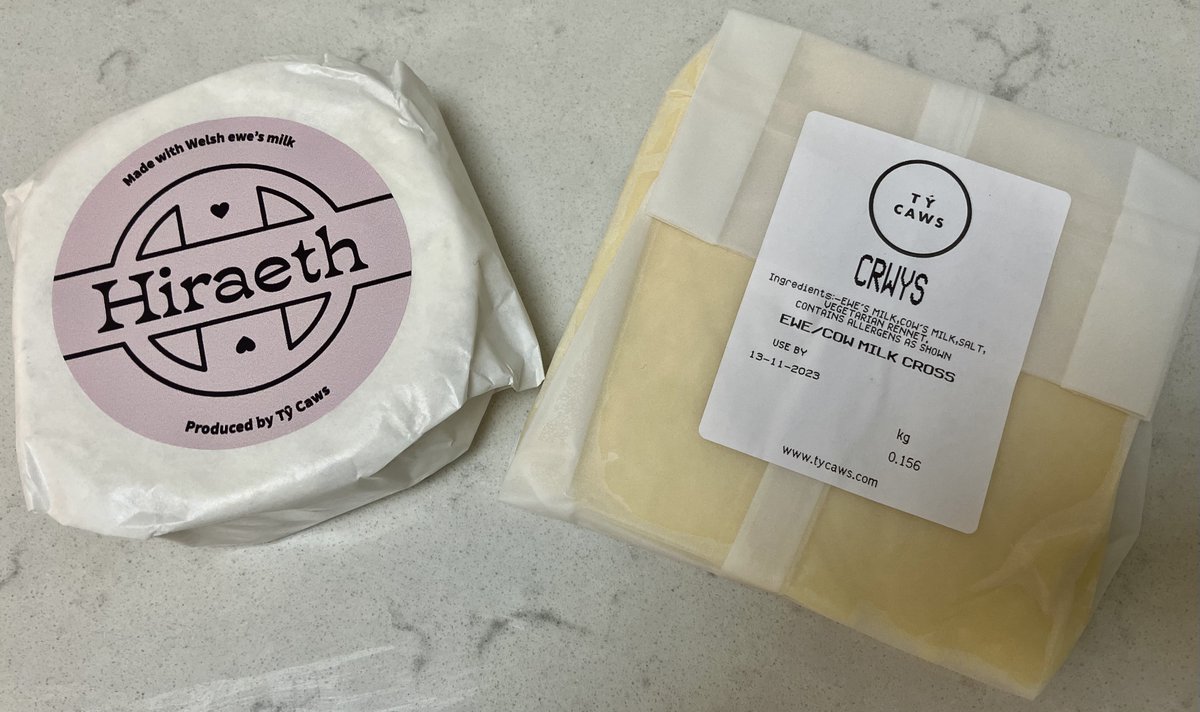Two of Britain's newest cheeses, both in my book 'Cheesespotting' and kindly given to me by Owen at Ty Caws @tycaws - genius who created them @FoodCentreWales and makes them only for distribution by Ty Caws. Prize of peer respect for anyone who translates Hiraeth and Crwys here.