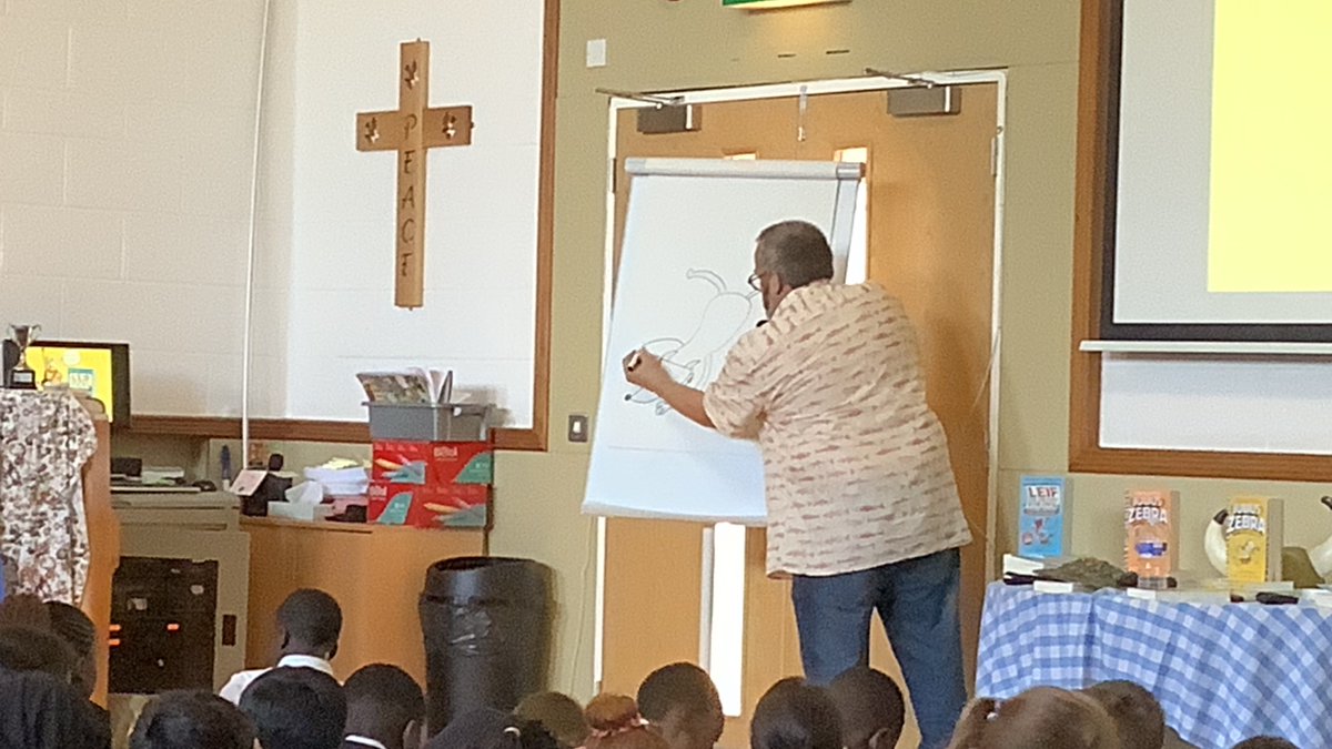 Primary_StJohns's tweet photo. Year 5 and 6 have enjoyed a fantastic time meeting the author and comic artist Gary Northfield. Thank you to @teacher_books for the inspiring history of an author who has created page popping history comics. #SJCReader https://t.co/x04fPiEmjI