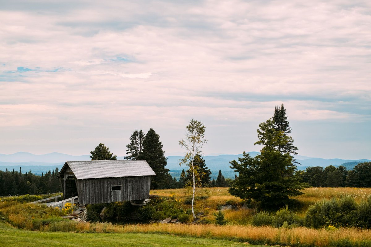 A covered bridge in the fall.