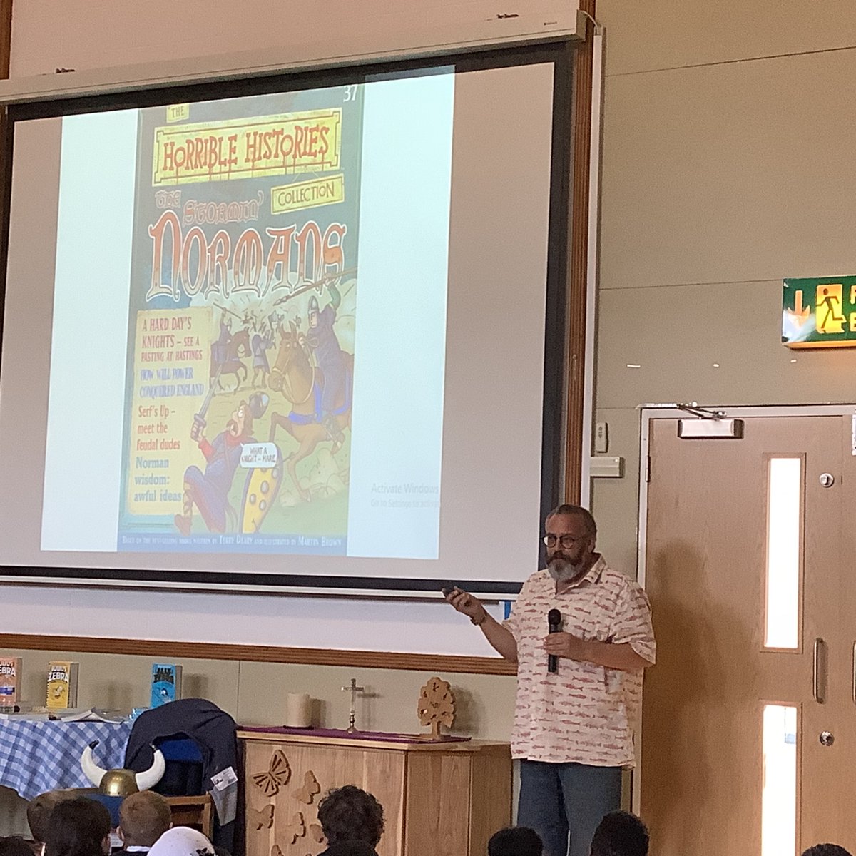 Primary_StJohns's tweet photo. Year 5 and 6 have enjoyed a fantastic time meeting the author and comic artist Gary Northfield. Thank you to @teacher_books for the inspiring history of an author who has created page popping history comics. #SJCReader https://t.co/x04fPiEmjI