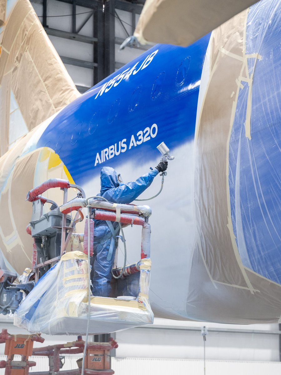 Ever wondered how planes are painted? A behind the scenes look at the new @JetBlue ‘Spotlight” livery A320 in the paint shop. #avgeek