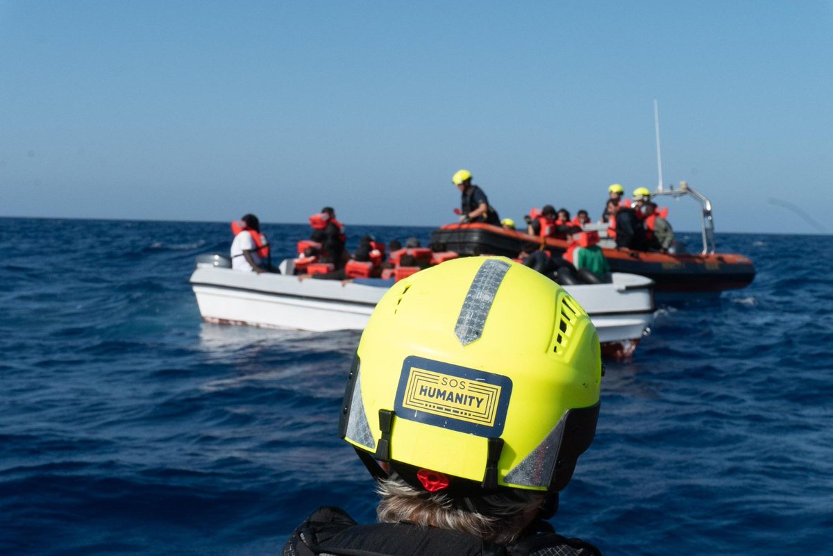 [1/3] 🔴Breaking: Third rescue within 18 hours! 28 people, amongst them women and babies, were rescued from an unseaworthy, overcrowded fiberglass boat. When #Humanity1 arrived, the boat was listing and risked capsizing in growing winds and waves over 2 metres high.