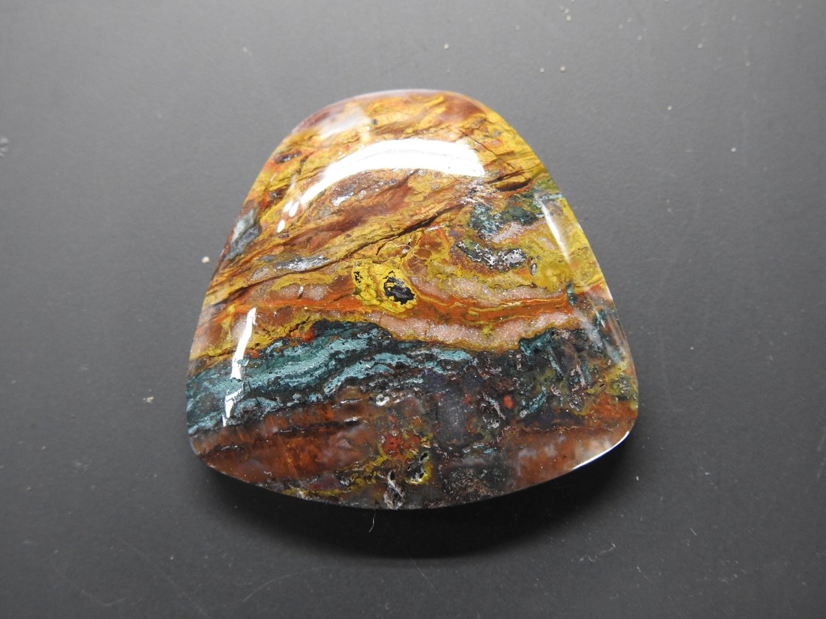 sgj4aj's tweet photo. This is one of my favorite cabochons I have made.  This is "Wrong Turn Jasper" with a spec of pyrite right in the middle. https://t.co/BvZ7C89ah1