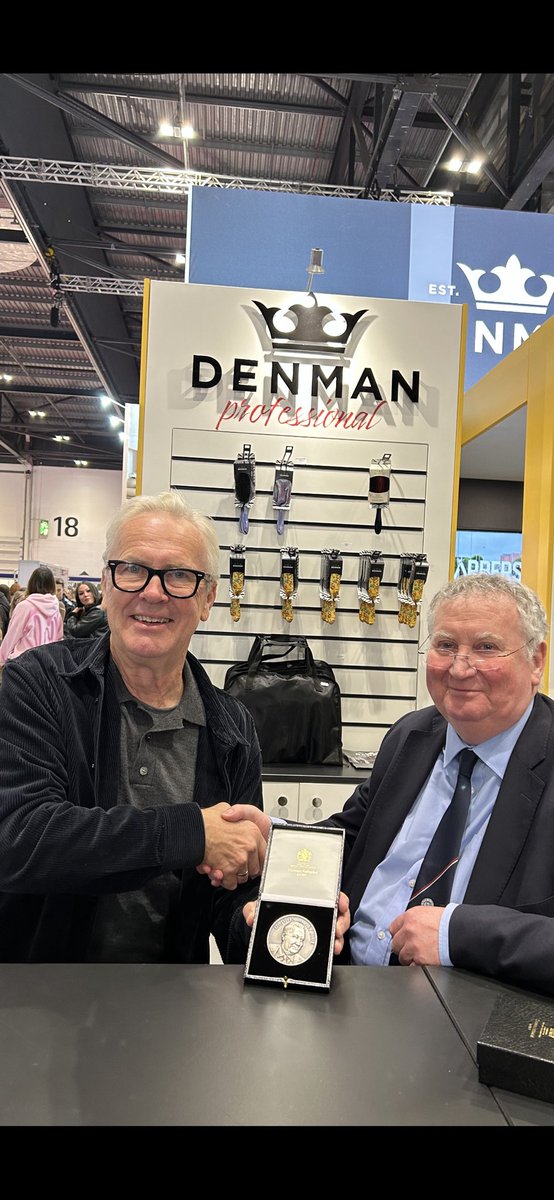 Honoured to receive today the Dr John Rainey MBE medal from the man himself at #salon23 
Collinge hairdressing has a long association with the iconic <a href="/DenmanBrush/">Denman Brush</a> . My father Peter was invited to demonstrate on the Denman stand at the first Salon International event 50 years ago