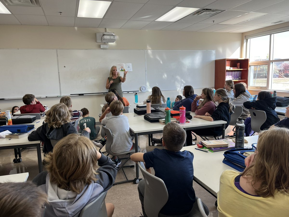 The grade 6’s from <a href="/macneillrps/">MacNeill School</a> are taking part in Education Week with an oral reader - Mrs. Harris! <a href="/RegPublicSchool/">Regina Public Schools</a>