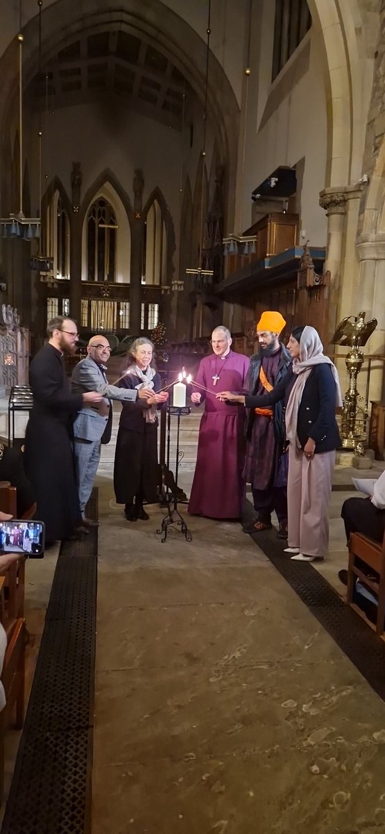 Our faith partners gather to light a candle for hate crime awareness week at Bradford Cathedral today. #HateCrimeAwarenessWeek