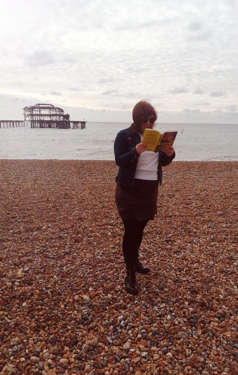 EnglishPhs's tweet photo. @PHSLibrary6 Miss Cowan has been caught reading in Brighton. We are hoping she got down safely from being upside down 🙃 #phscaughtreading https://t.co/Un4sFb7qVX
