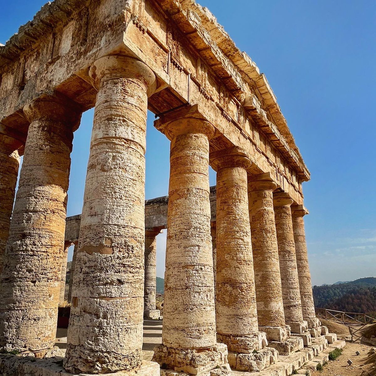 Family archaeology trips 🤓 This ancient temple at Segesta dates back to the 5th century BC. Amazing how much remains! #Archaeology #Sicily #Segesta #Temples