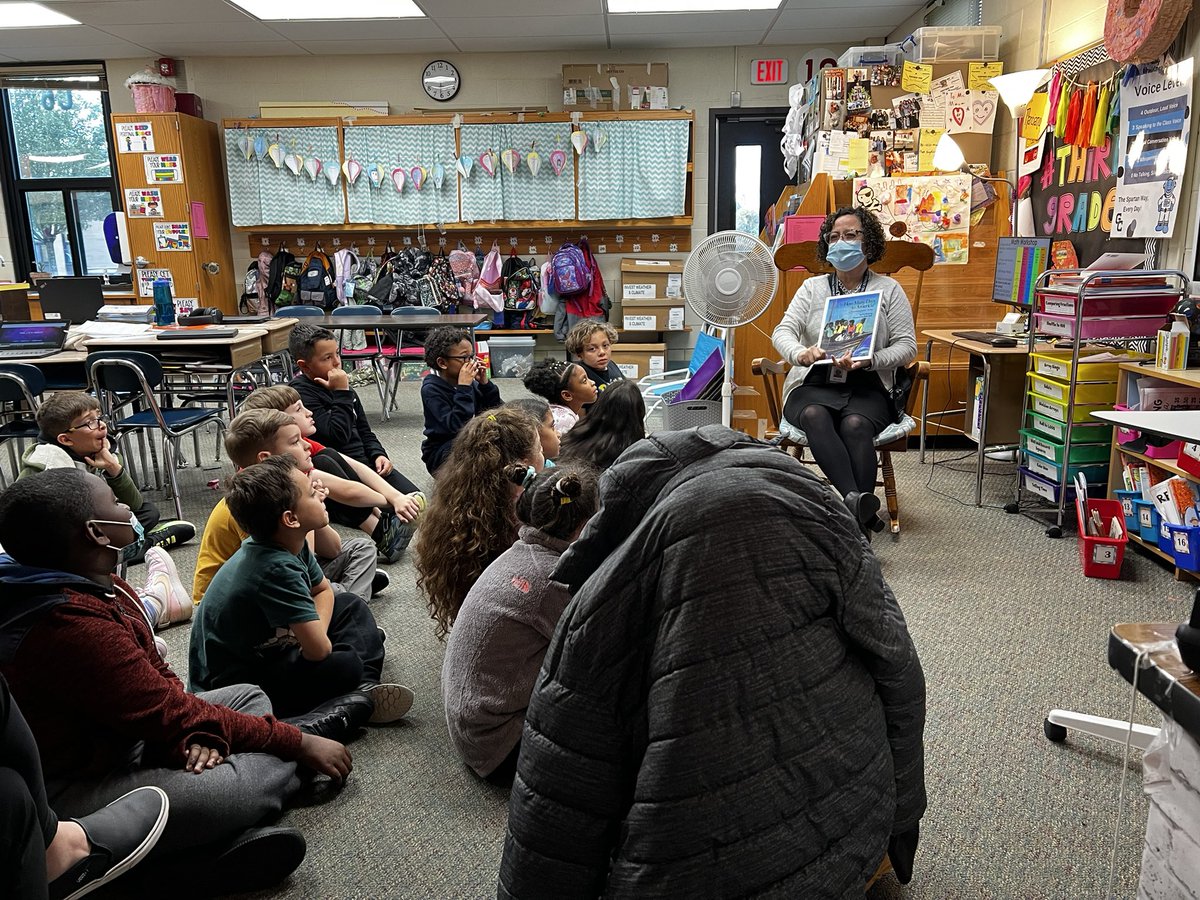 Today we had our first guest reader!  Thank you to Mrs. Ortiz for coming!  #gcpride #armstrongstars
