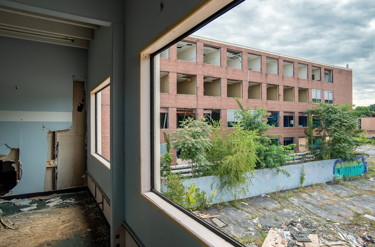 The view from a scrapped out classroom at an abandoned religious school in Ohio.