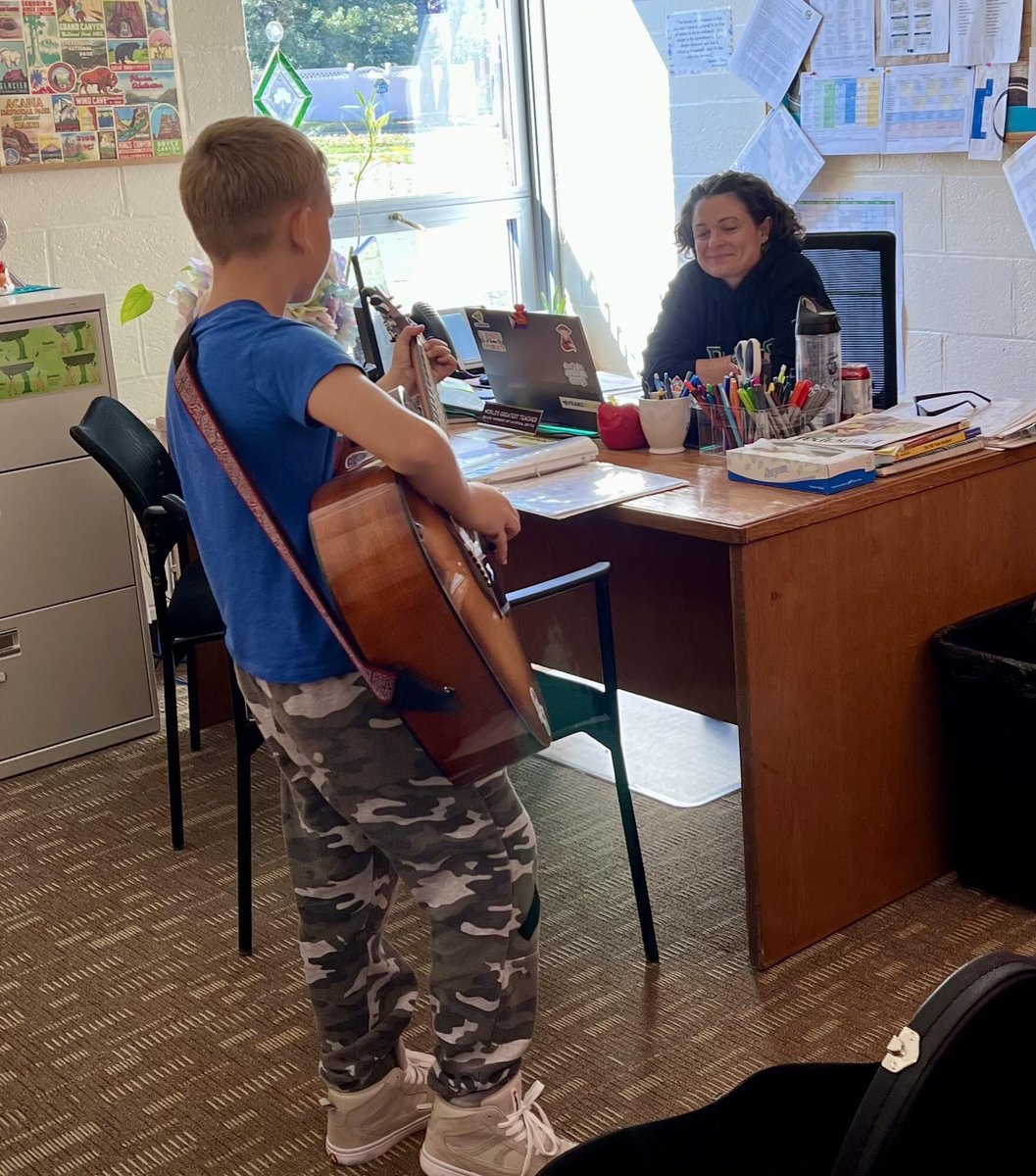 PowderMillRocks's tweet photo. A few lucky Powder Mill School staff members were treated to a mini concert from Sammy, a camera shy fifth grader. He has been practicing guitar for 2 years &amp; his hard work has paid off. Continue to #BeGOLD, Sammy, and let others see your talent!  #PowderMillROCKS  #BeGOLD https://t.co/pgJc9zQ8Ny