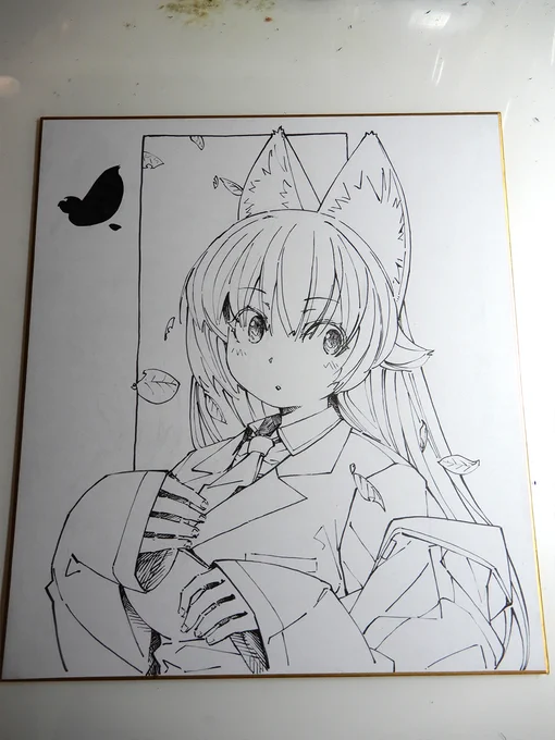 丸顔とコート