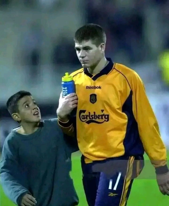 Can you guess the boy,Steven Gerrard is walking with.
The boy is one of the best players at the moment.