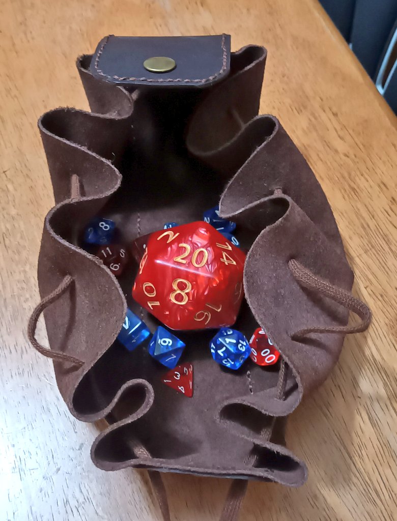cowforgefoundry's tweet photo. Dice pouch Proof of concept done

I finished up the seams the other day while waiting for my big boi dice from @dicesukidice. It fills up about half the pouch when stowed with space for a few more sets. There's a snap button loop on the back you can secure to a belt, too. https://t.co/hkgkfKwMSy