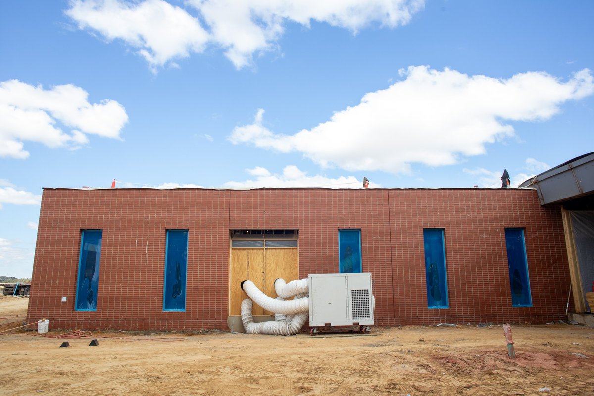 The BlueOval City TCAT campus is progressing as we are approximately halfway through construction. Brick and insulation is currently being installed. #blueovalcity #tcat #construction