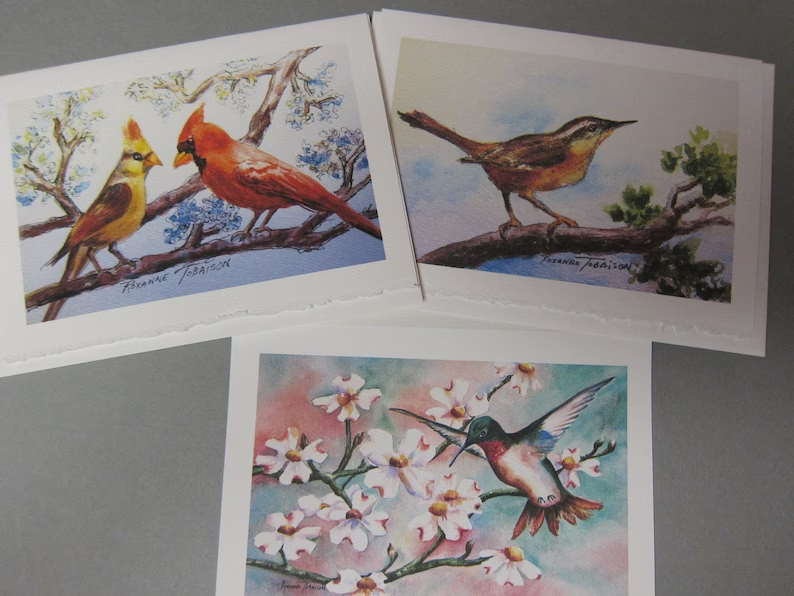 PamelaBaker67's tweet photo. https://t.co/cPgoVFbHZQ @RTobaison @WatercolorsNMore #HummingbirdCardinalsWren #WatercolorNoteCards #bmecountdown https://t.co/zdnNIfOrCu