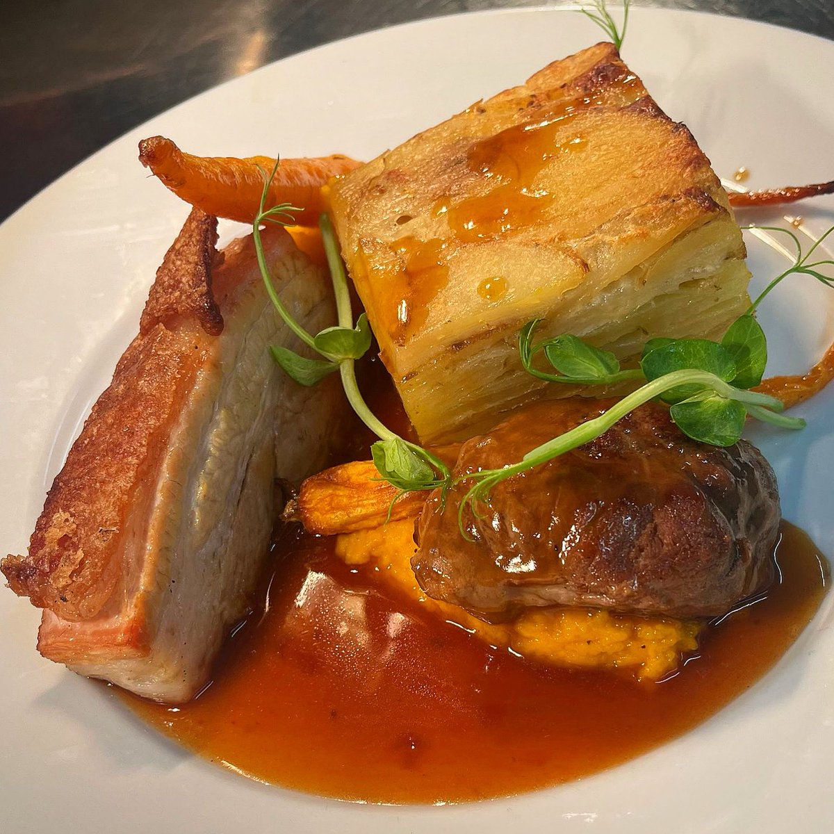 HorningFerry's tweet photo. Pressed pork belly, confit cheek, carrot, nashi pear, dauphinoise potato, pork jus. 

Yet another autumnal stunner from our new menu! https://t.co/UMrMzN6dA3