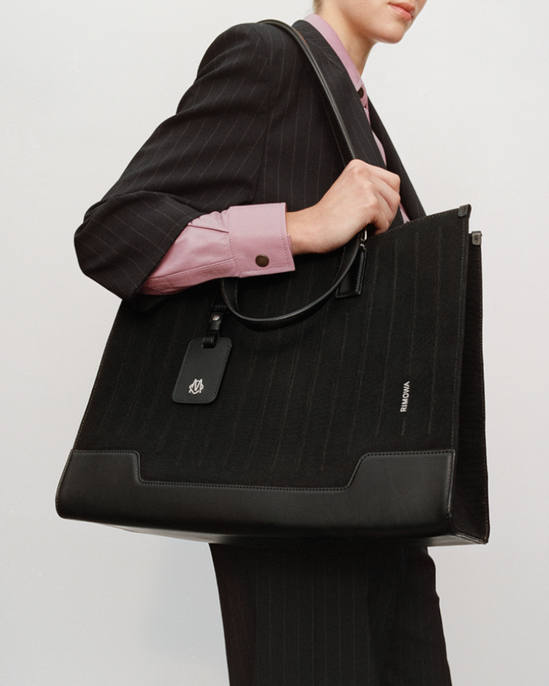Rimowa never still tote sales