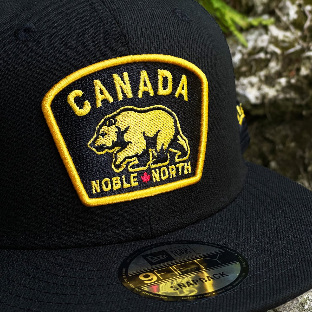 NobleNorthCo's tweet photo. Easily, one of our staples and that’s why it’s back! 🍁🐻🍁
.
Canada Badge - Black New Era 9Fifty Meshback w/ Black UV ⚫️🟡
.
Now available in-store &amp; online! 🛍️💻
.
#NobleNorth #NewEraCap #NewEraCaps #9Fifty #SnapbackHats #Meshback #Hats #Lids #Canada https://t.co/7aqNesV2mL