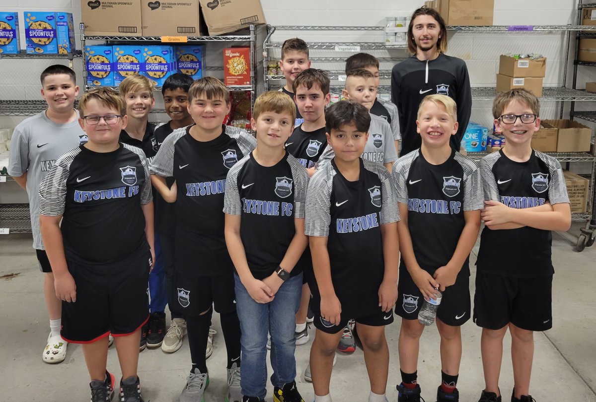 The Keystone FC United 12B soccer team recently volunteered at the Red Land Center, offering their helping hands for the day. Instead of practicing, they decided to serve their community by stocking shelves and helping in various ways.