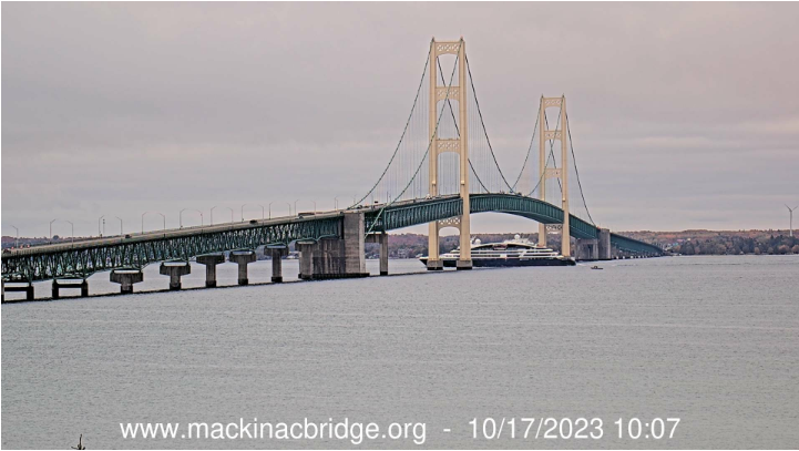 mackinacbridge's tweet image. The cruise ship LE DUMONT D'URVILLE looks pretty small under the towers of the Mighty Mac!😎