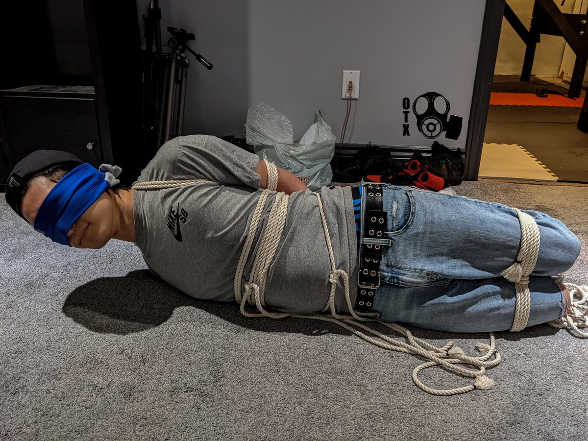 .<a href="/Repeating1s/">Repeating1s</a> changed up the hogtie and added a soccer sock blindfold. Despite wiggling and picking at the ropes, I wasn't getting free