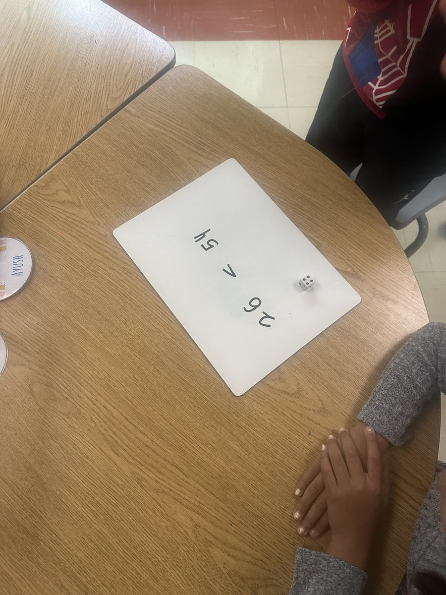 militoGr1's tweet photo. Today we worked with a partner to roll and compare different numbers! @StRoseLimaOCSB https://t.co/sGi9I89Gjr