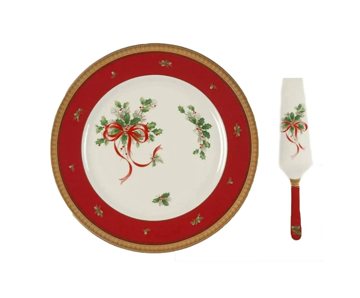 G97816960Girl's tweet photo. Mikasa Palatial Holly Gold L3468 Christmas cake serving plate with matching lifter. https://t.co/9PpMhdbWi4 via @Etsy #BuyfromGroovy #antiqueshop #tableware #dinnerware #Christmas #vintageChristmas #Christmastableware #Christmasdishes #EtsyFestiveFinds #Mikasa #MikasaPalatialHolly #PalatialHolly #EtsySellers