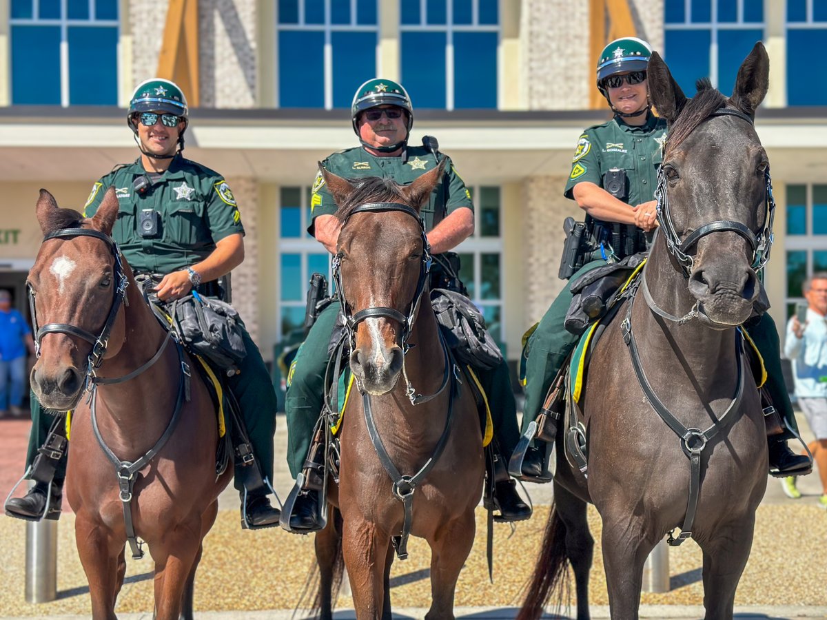 Spreading smiles one hoofbeat at a time! Meet <a href="/orangecosheriff/">Orange County Sheriff's Office</a> Mounted Unit and their trusty steeds: CPL Mike Vasquez &amp; Remington (10), SET Larry Slimick &amp; PC (12), and Master Deputy Lindsay Gonzalez &amp; James (16). Thanks for making Hamlin safer and happier! 🐎🚓💙🖤 #HamlinFL
