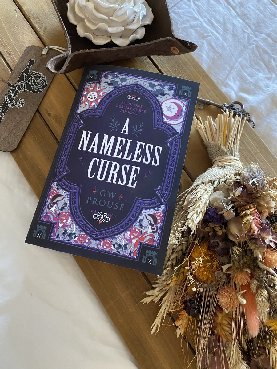 It's officially out! Welcome to the world of A Nameless Curse. A New Adult/Adult slow burn fantasy with fae, court intrigue, fake dating, and a cursed kingdom. #BookBirthday