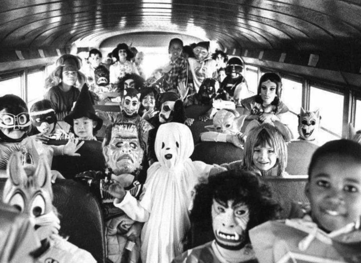 historyinmemes's tweet photo. Halloween on the School Bus, 1980s

The history of trick-or-treating can be traced back some 2,000 years ago to an ancient pagan festival called Samhain, which was celebrated by the Celts from October 31st to November 1st. During the festival, it was said that the dead came back to the land of the living. To appease these spirits, they would provide food, bonfires, and sacrifices (livestock and crops).

Around the 9th century, as Christianity spread throughout Europe, Catholic festivals such as All Hallows' Eve (Oct. 31), All Saints' Day (Nov. 1), and All Souls' Day (Nov. 2) became more popular. During this time, poor children would walk from house to house, begging for money or "soul cakes" (a round cake made of nutmeg, ginger, cinnamon, and raisins with a cross on top). In return, they would sing and pray for the souls of the providers. The practice became known as souling.

By the late 1800s, Irish immigrants fleeing the potato famine and other European immigrants brought over the traditions of celebrating All Hallow's Eve.

By the 1920s, the practice of souling evolved into pranks and mischief. When the Great Depression hit, the tradition saw the rise of vandalism, destruction of property, and in some instances, violence.

As a response to the increase in crime, local communities began to curb the chaos by putting together activities and throwing parades. Homes were encouraged to give out treats as a way to encourage good behavior. As the Great Depression came to an end and sugar rations were lifted, candy companies saw a golden opportunity to make money. By the 1950s, Halloween had become the holiday that we know of today.