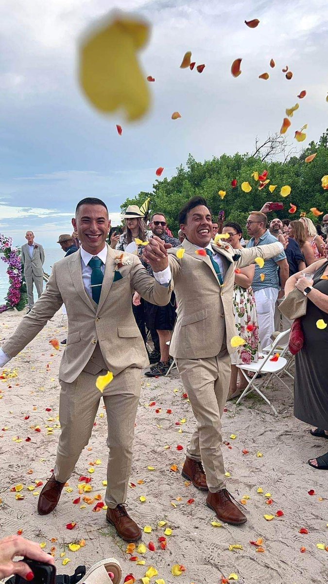 Our nephew got married. I couldn't attend due to the novel, but I love this photo of the happy couple. <a href="/AnnVanderMeer/">Ann VanderMeer</a> got ordained to officiate!