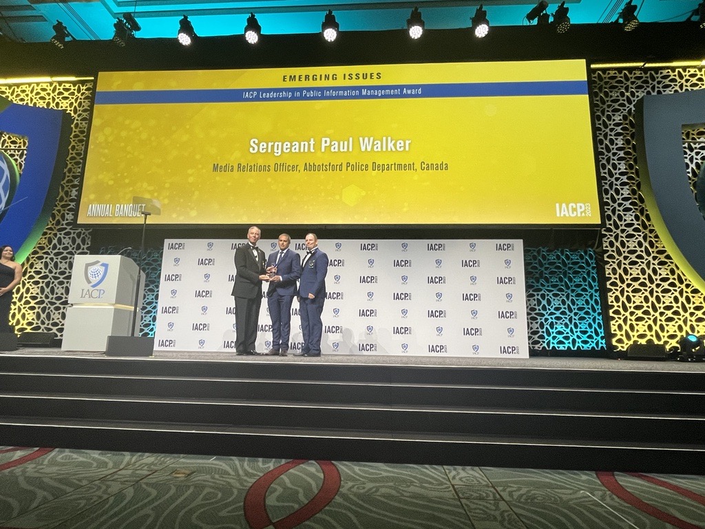 TheIACP's tweet photo. Congratulations to @Sgt_WalkerAPD, Media Relations Officer, Abbotsford Canada Police Department, the IACP/@Flock_Safety Leadership in Public Information Management Award winner! #IACP2023 https://t.co/SDs64PGfoW
