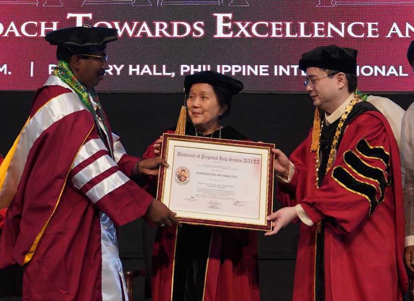 LOOK: University of Perpetual Help System Dalta (UPHSD) President Anthony Jose Tamayo, Ph.D and Chair of the Chief Executive Board Dr. Daisy M. Tamayo award Indian Philanthropist Gunasekar Ariyamuthu, the certificate of prestigious Doctor Honoris Causa, during the University’s
