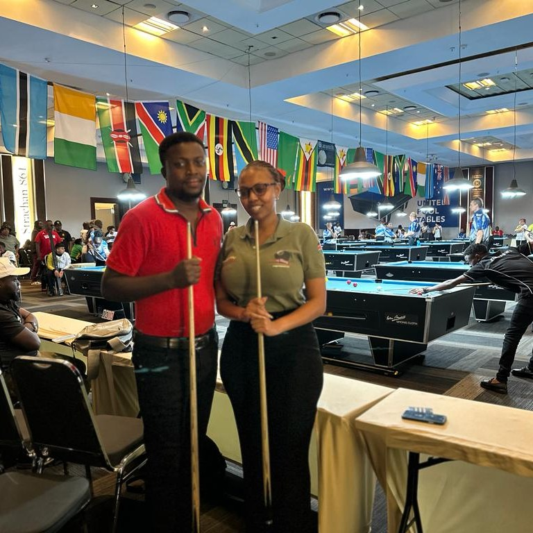Mbogi_Yetu's tweet photo. In the true Base Yetu culture, the Ksh. 500,000 winner of the 2022 Base Yetu Pool Tournament David Mbuthi flying the Kenyan flag high at the 2023 All Africa Blackball Championships in South Africa. Competing on the global stage is a testament to the multiplier effect of Base Yetu's grassroots talent search and nurturing, and David's excellent effort. Kudos!
