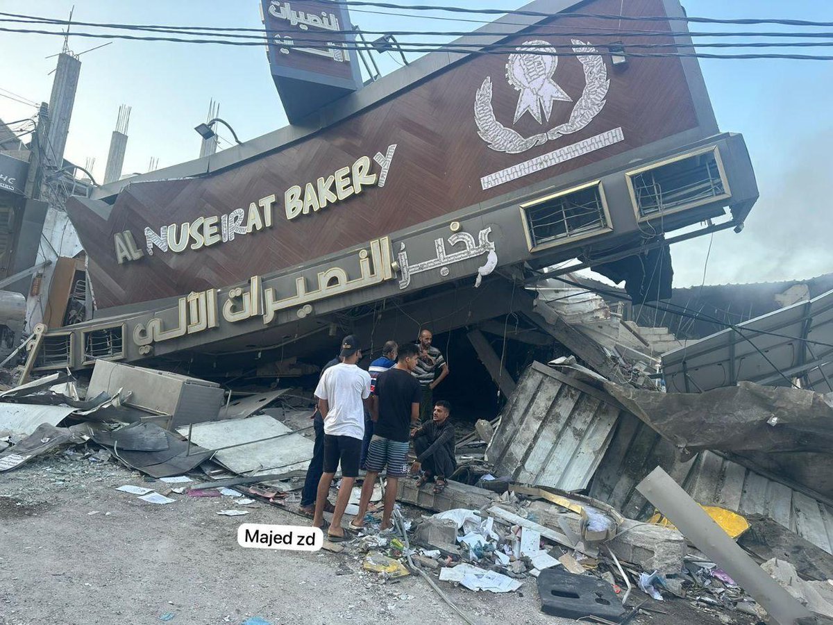 Al-Nuseirat Bakery  was targeted by Israeli occupation warplanes last night. #GazaUnderAttack