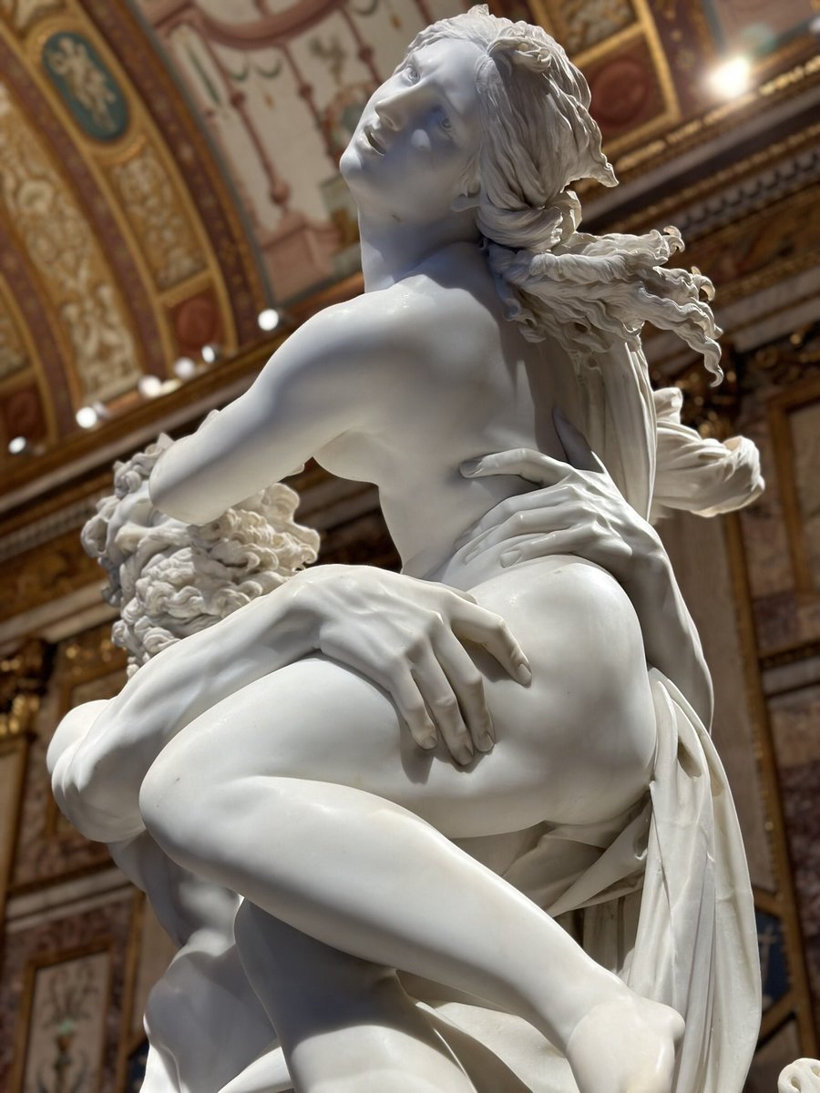 One of the most iconic sculptures ever. This one portion has been photographed millions of times. The hand impression into her thigh is astounding to everyone, but what is the story behind the famous sculpture. 

The Rapimento di Proserpina by Bernini is based on the Latin myth