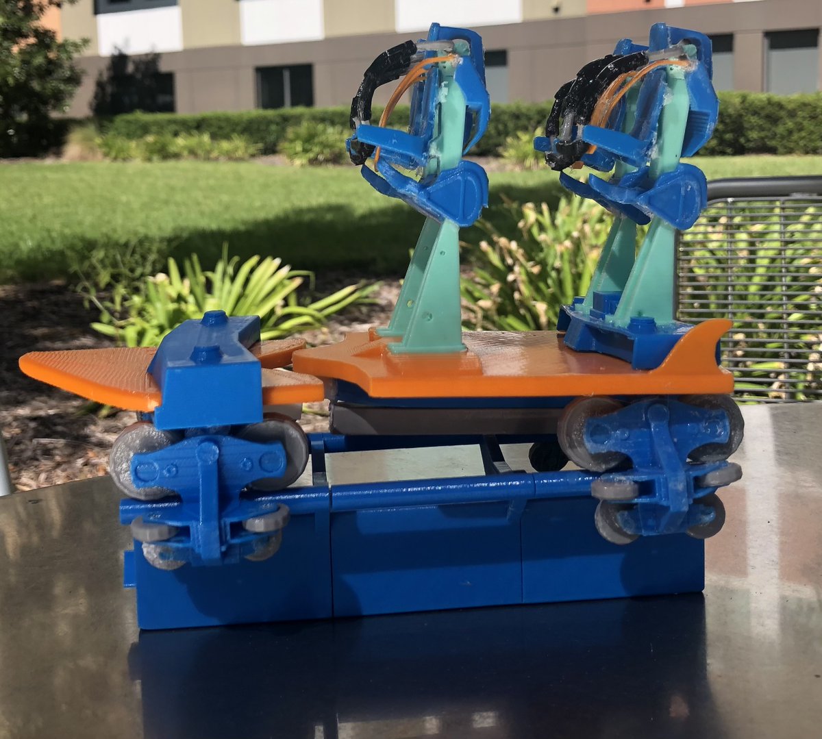 KohlerCoaster's tweet photo. Inspired by Pipeline: The Surf Coaster at @SeaWorld, I 3D printed and assembled this B&amp;M Surf Coaster model at 1:20 scale! 

This print is around 8 inches (20cm) long, 4 inches (10cm) wide and 7 inches (18cm) tall, using 6 different colors of filament and over 100 parts. https://t.co/5E7nSeAXSZ