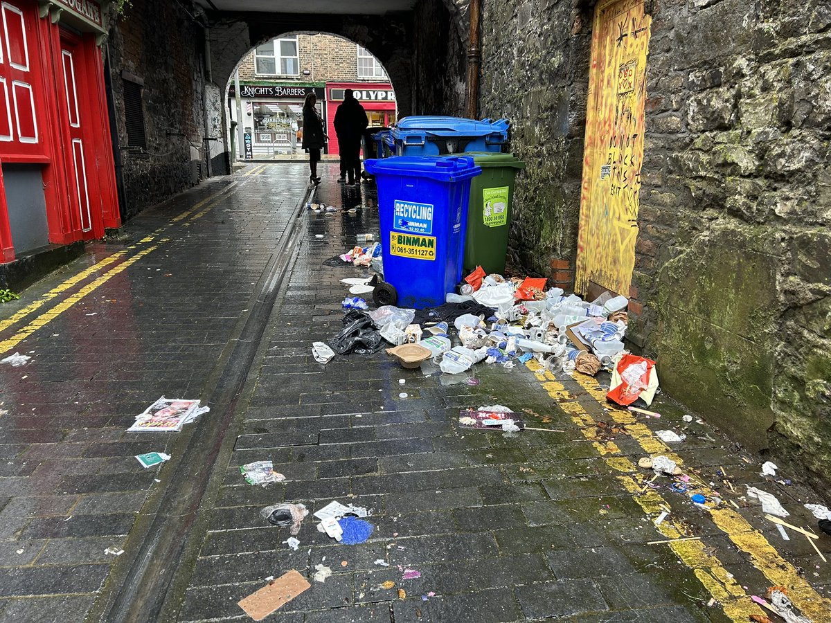 MaHogansBar's tweet photo. Some cities promote their historic lane ways as destinations. For Limerick’s lanes, they’re just places for bin storage and dumping. https://t.co/nCEmv6HENf