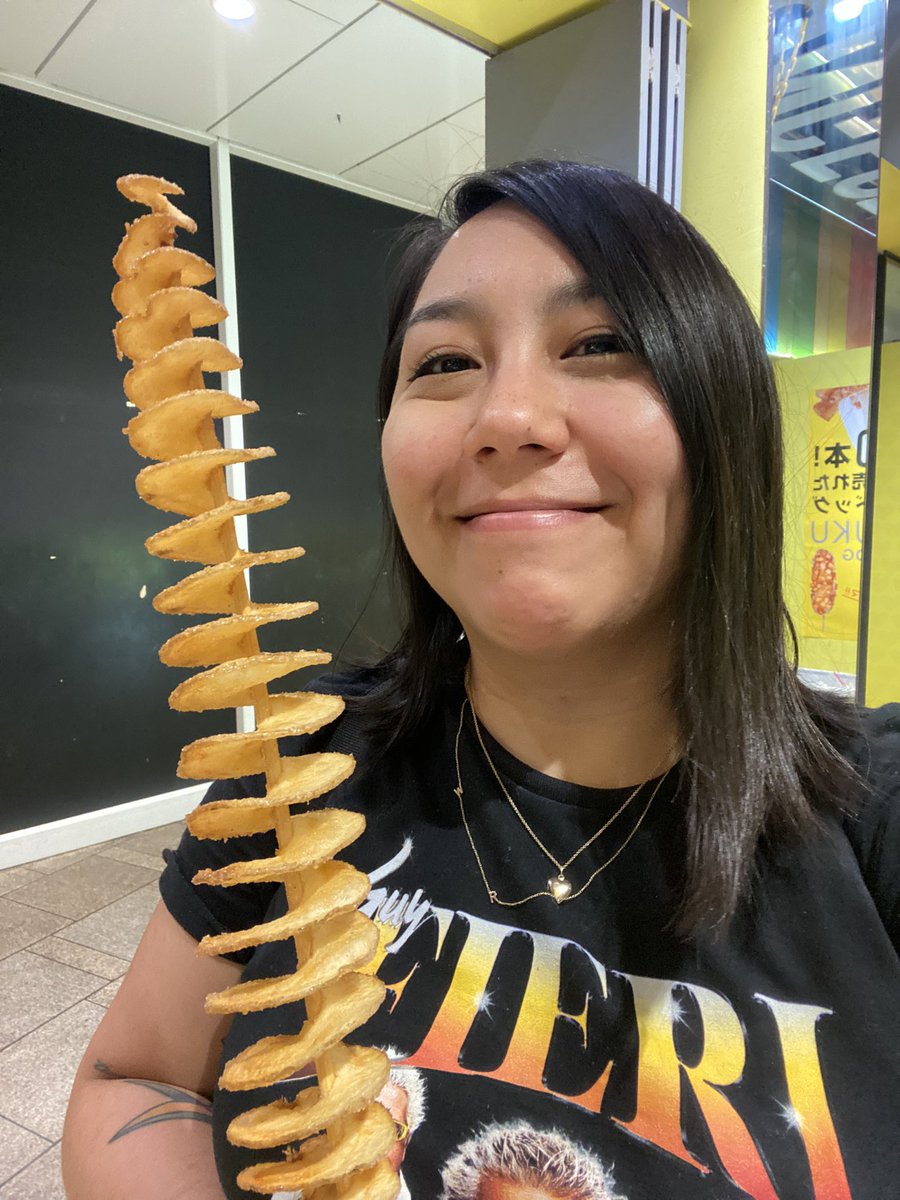 Self portrait with a long potato in Harajuku