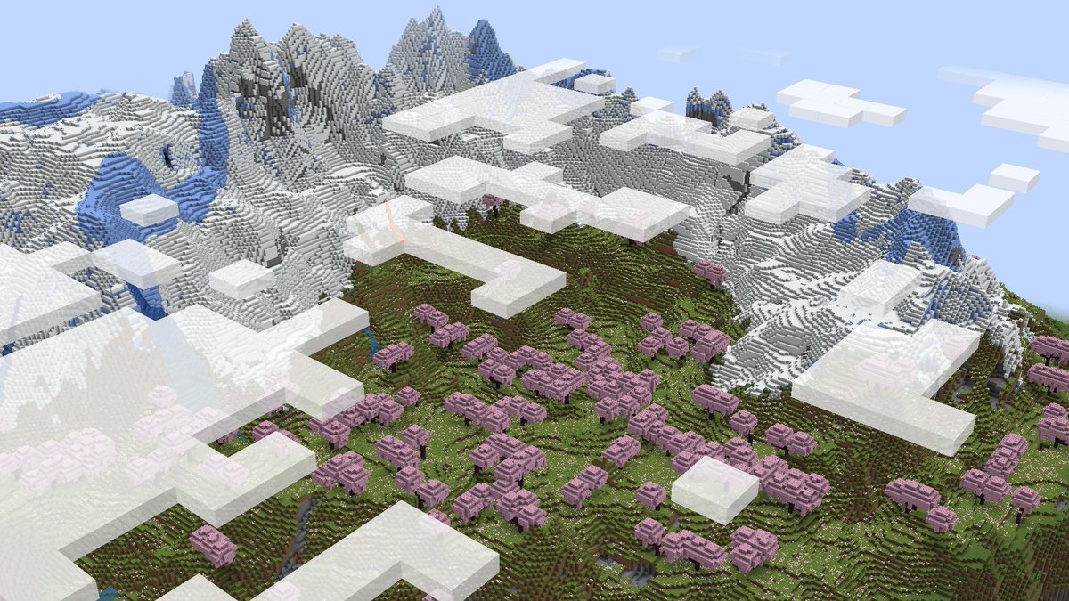 The seed -1550994645736498837 will spawn you in a beautiful cherry valley partially surrounded by frozen peaks!