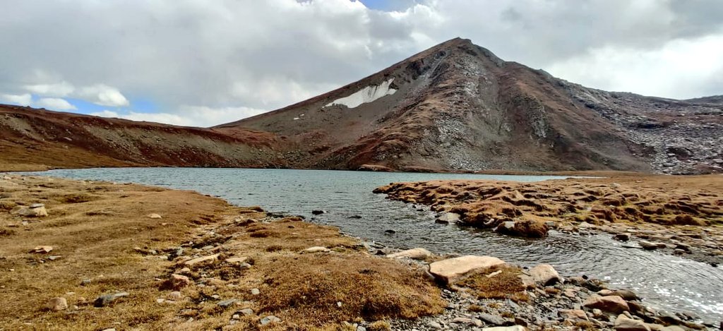 LifeLensScape's tweet photo. Dharamsar, an alpine lake in Kaghan Valley, Khyber Pakhtunkhwa. Its approx 4,100 meters above sea level to the left of Babusar Top going eastwards from Chilas on the Karakoram Highway. 
The lake is close to the border of Khyber Pakhtunkhwa and Azad Kashmir just south of the meeting point of all three of Khyber Pakhtunkhwa, Azad Kashmir and Gilgit-Baltistan.
📷 @BakhatNasr 
#Pakistan