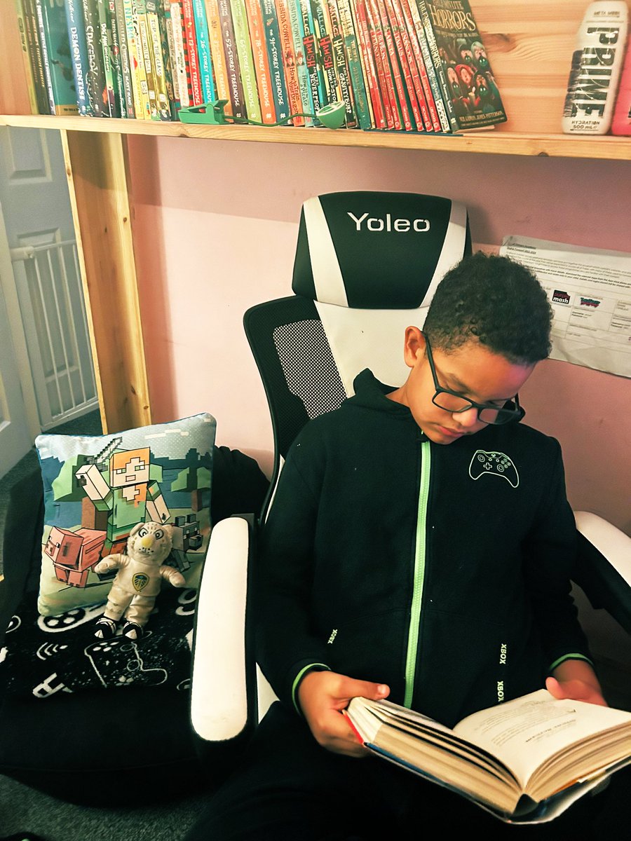 d6dd536c6a4243d's tweet photo. After a busy day, Archie is having some down time &amp; reading a book by one of his favourite authors. #Readingselfie #bookbonanzaweek @BirstallAcad https://t.co/K6HH1vOQtg