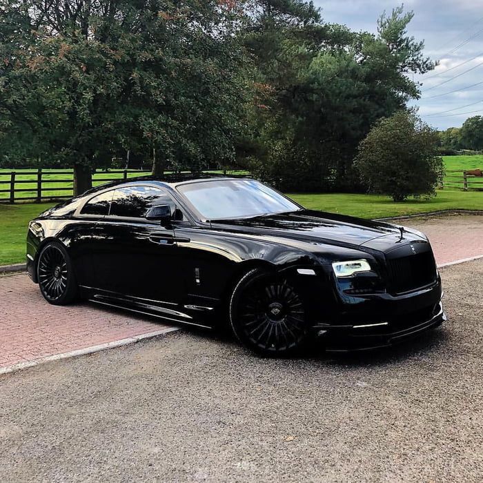 Blacked out Rolls Royce Wraith