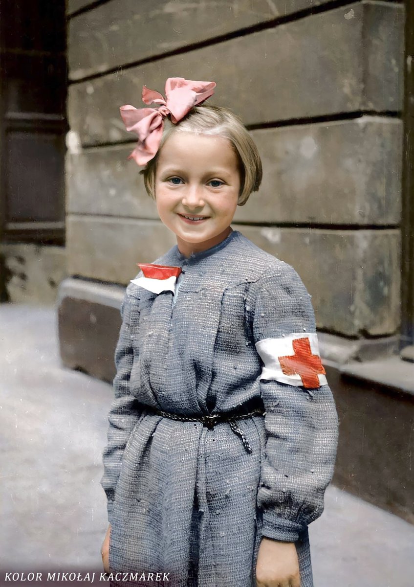 8-year-old Róża Maria Goździewska, the youngest Polish Nurse of the #Warsaw Uprising, in 1944. She survived the war and died in 1989 at the age of 53 (colorization via @KolorHistorii). #History #WWII