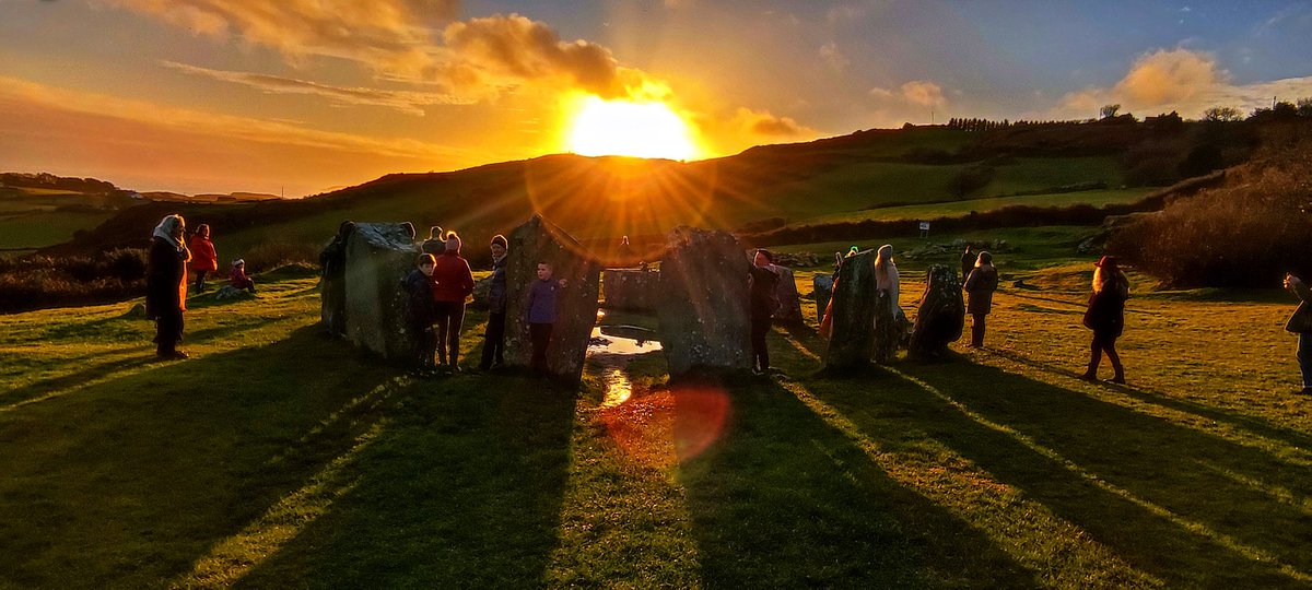 HJG662's tweet photo. @HouseChambers @megportal This is winter solstice last year at Drombeg circle in Co Cork. Looking through the portal stones towards the setting sun in the SW. The recumbent axial stone visible on the far side of the circle. https://t.co/leDPcX1kuC