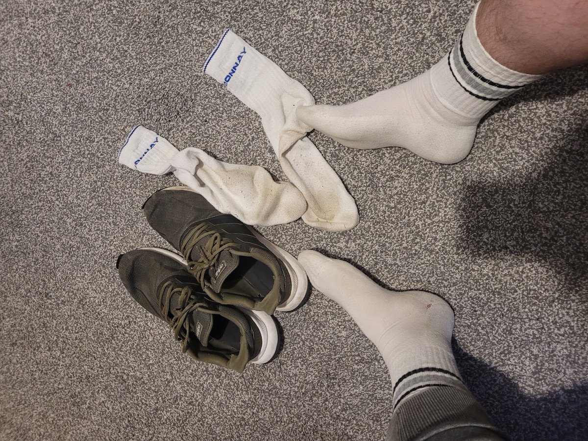2 pairs of very smelly socks that I "borrowed" from a straight co-workers gym bag. They are absolutely rank. Wore them in front of him all day and he has absolutely no idea 😈 #smellysocks