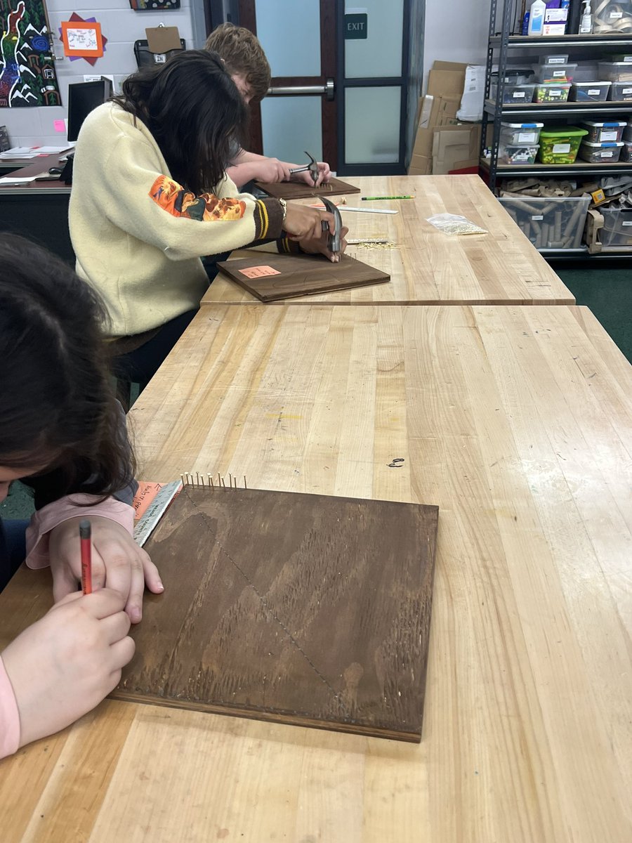 Meade_GATE's tweet photo. From Monet to Monsters to digging for Dino DNA,SPMS kept us busy this week in the STEAM Lab. Thanks to Mr. Hager’s carpentry class, art students continued working on the collaborative string art of Meade County. Students also started SILS projects and began creating robot arms. https://t.co/vGwsW5ugy1