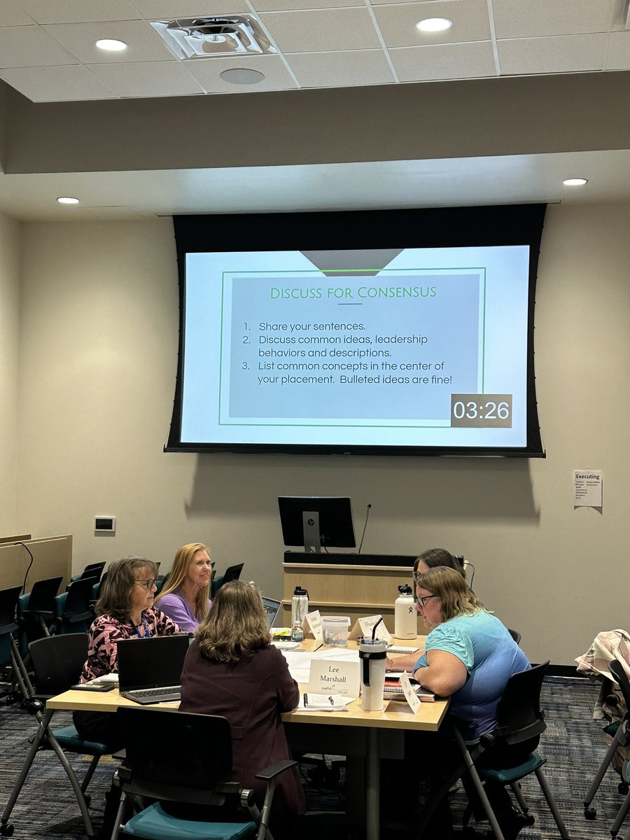 PGIVBCPS's tweet image. Participants in the Aspiring Leaders cohort work on their consensus placement for the statement, &quot; a leader is a person who&quot;. #LeadVB